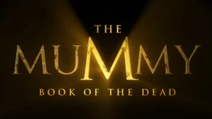 Logotipo dourado de The Mummy: Book of the Dead sobre fundo escuro, divulgado para o novo filme A Múmia 4